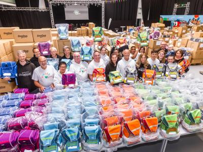 250 Schulranzen für Dortmunder Kinder mit der Stiftung Kinderglück